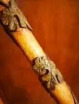 Folk art cane with vine motifs