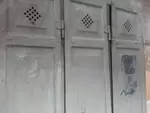 Locker room with three riveted doors and pressed sheet metal