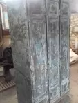 Locker room with three riveted doors and pressed sheet metal