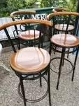 Lot of four steel and wood stools