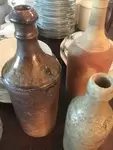 Lot of three bottles 19th in terracotta and gre