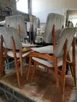 Lot of vintage wood and skai chairs