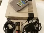 Nintendo NES, cables and a game