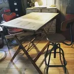 Old drawing table and its stool