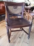 Old exotic wood and cane armchair