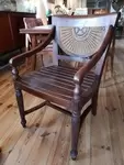 Old exotic wood and cane armchair