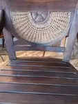 Old exotic wood and cane armchair