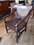 Old exotic wood and cane armchair