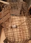 Old fishing basket with feet