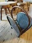 Old rattan magazine rack