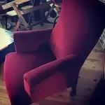 Old red velvet armchair