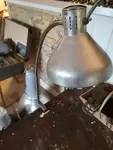 Old workshop lamp on vice