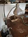 Old workshop lamp on vice