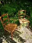 Pair of old straw armchairs