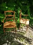 Pair of old straw armchairs