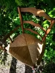 Pair of old straw armchairs