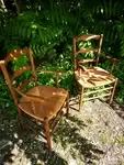 Pair of old straw armchairs