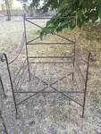 Pair of wrought iron garden armchairs