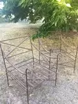 Pair of wrought iron garden armchairs