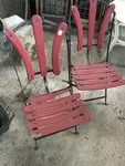 Pair of wrought iron garden chairs