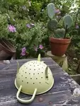 Yellow enamel colander 