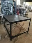 Perforated steel table
