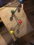 Wrought iron wood ball coat rack