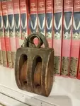 Old wooden pulley with two sheaves 