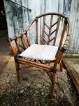 Rattan and leather armchair