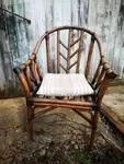 Rattan and leather armchair