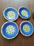 Set of four plates