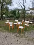 Set of six wood and white skai chairs