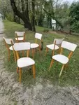 Set of six wood and white skai chairs