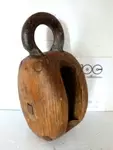 Small wooden pulley in bronze