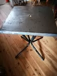 Stripped metal bistro table