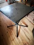 Stripped metal bistro table