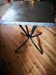 Stripped metal bistro table