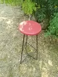 Black lacquered metal stool