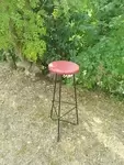 Black lacquered metal stool