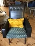 Upholstered black leather chair