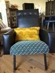 Upholstered black leather chair
