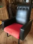 Upholstered black leather chair
