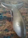 Whale tail knocker