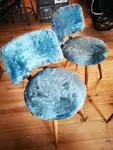 Wooden chair and blue toupee