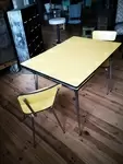 Yellow painted formica table and chairs
