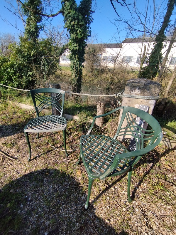 Pair of cast iron aluminum garden chairs