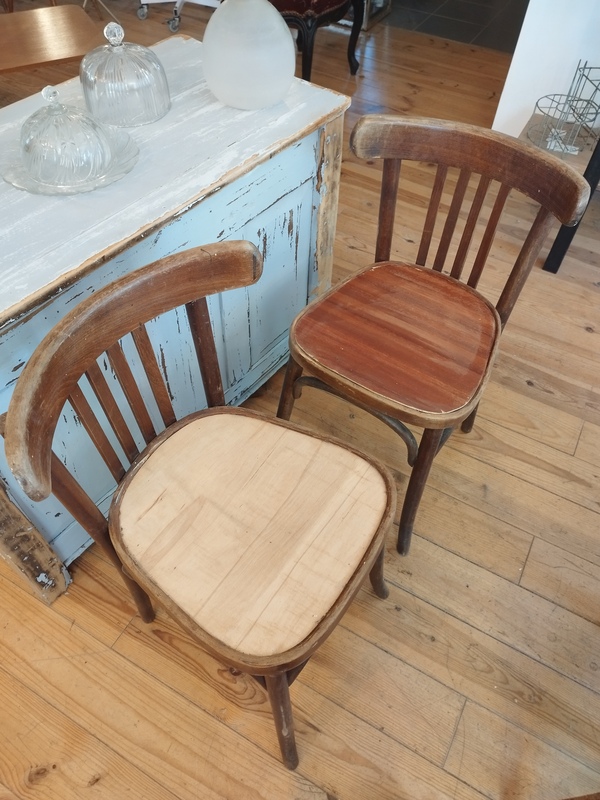 Pair of wooden bistro chairs