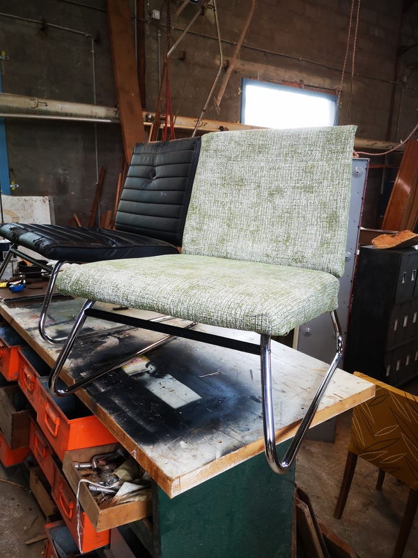 Pair of designer armchairs