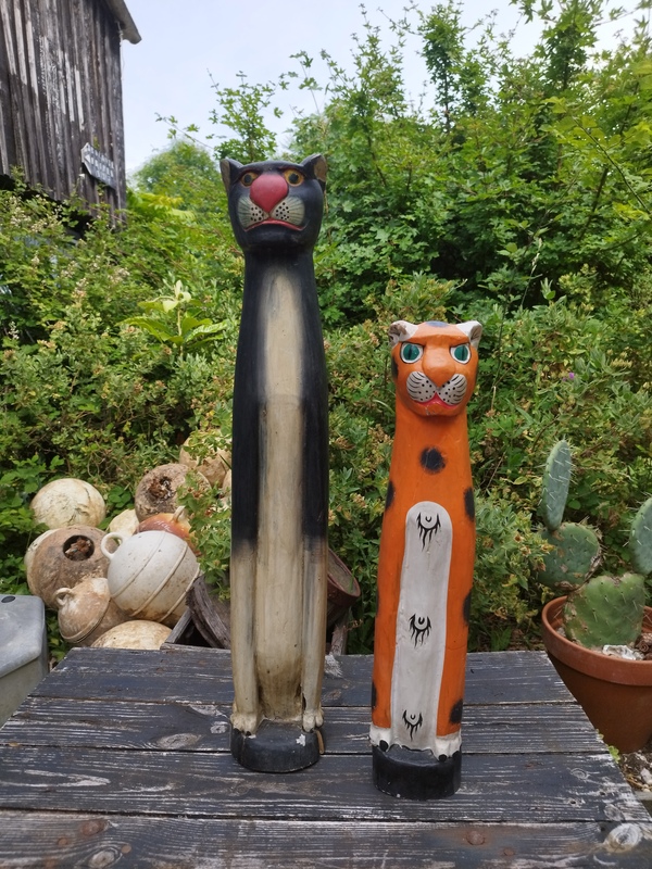 Panther and tiger carved in wood 