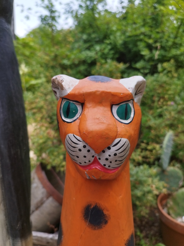 Panther and tiger carved in wood 